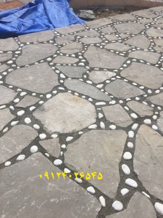 نصب سنگ مالون سنگ لاشه اجرای سنگ مالون در کف فرش و ویلای سنگی